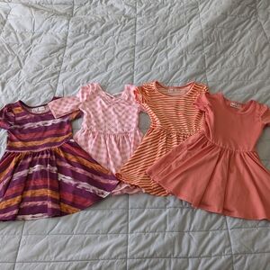 Dot Dot Smile Kids Dresses in Purple, Pink, and Orange